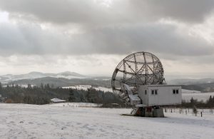 Snowy scene with a parabolic antenna